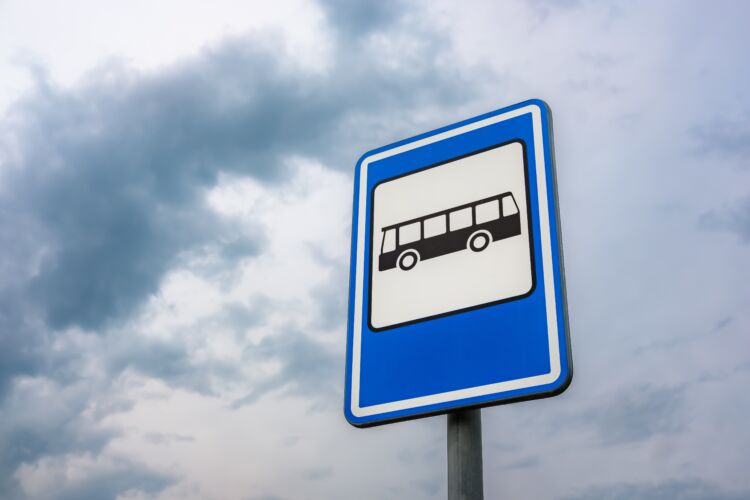 low angle shot of a bus stop sign